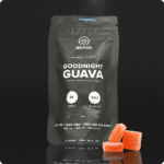 Image of a bag of High Peaks cannabis gummies, on a black background. 