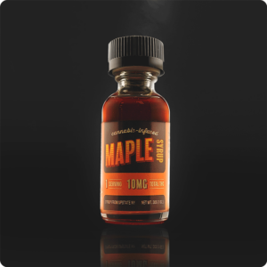 Image of a small re-sealable jar filled with THC Infused Maple Syrup. On black background 